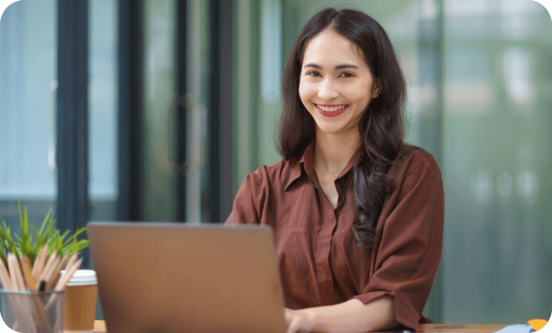 Professional woman with laptop representing building a stable offshore team