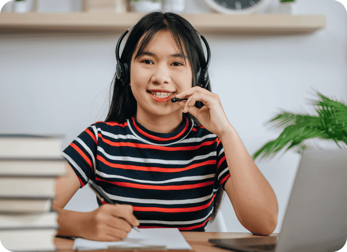 Filipino professional with headset working as part of a remote team