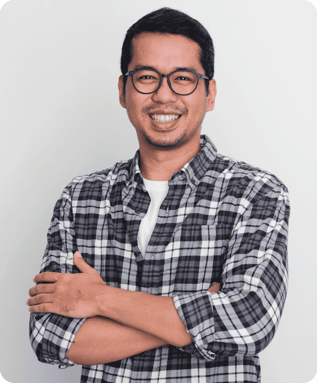 Professional smiling with arms crossed