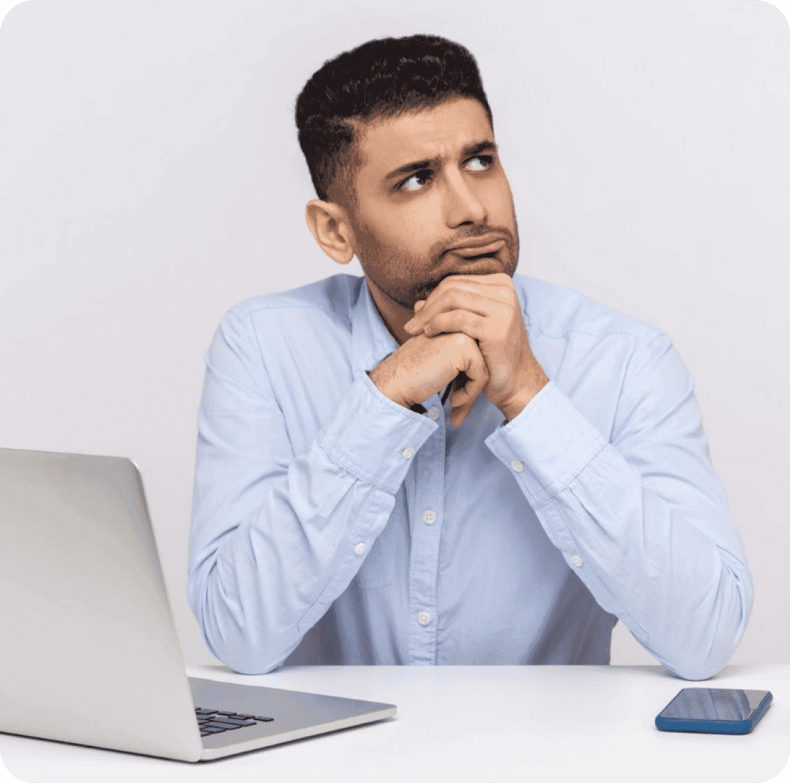 Business owner thinking about offshore staffing comparison